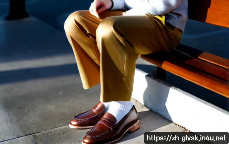 양말 패션 트렌드 - Photorealistic street-style fashion scene featuring a stylish young adult seated on a minimalist cit...